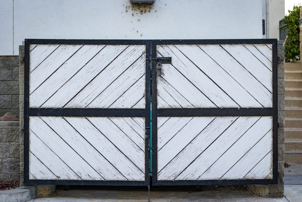 Bespoke steel driveway gates installed on a London residential property by NOVA Steels
